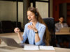 Woman makes a phone call with the onOffice telephone module