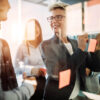 business team meeting, blonde woman laughing