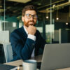 Man at his laptop in the office